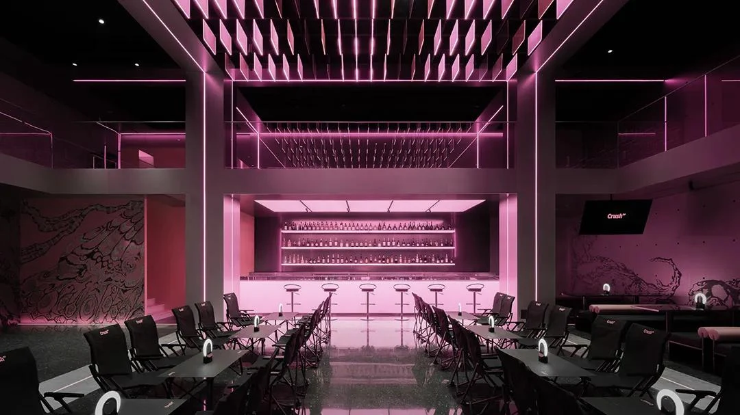 Pink illuminated private bar interior